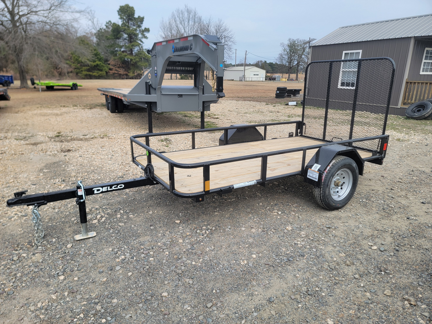 New 2026 Delco Trailers U010 10' x 60" Pipe Top w/ Folding Tailgate Utility Trailer