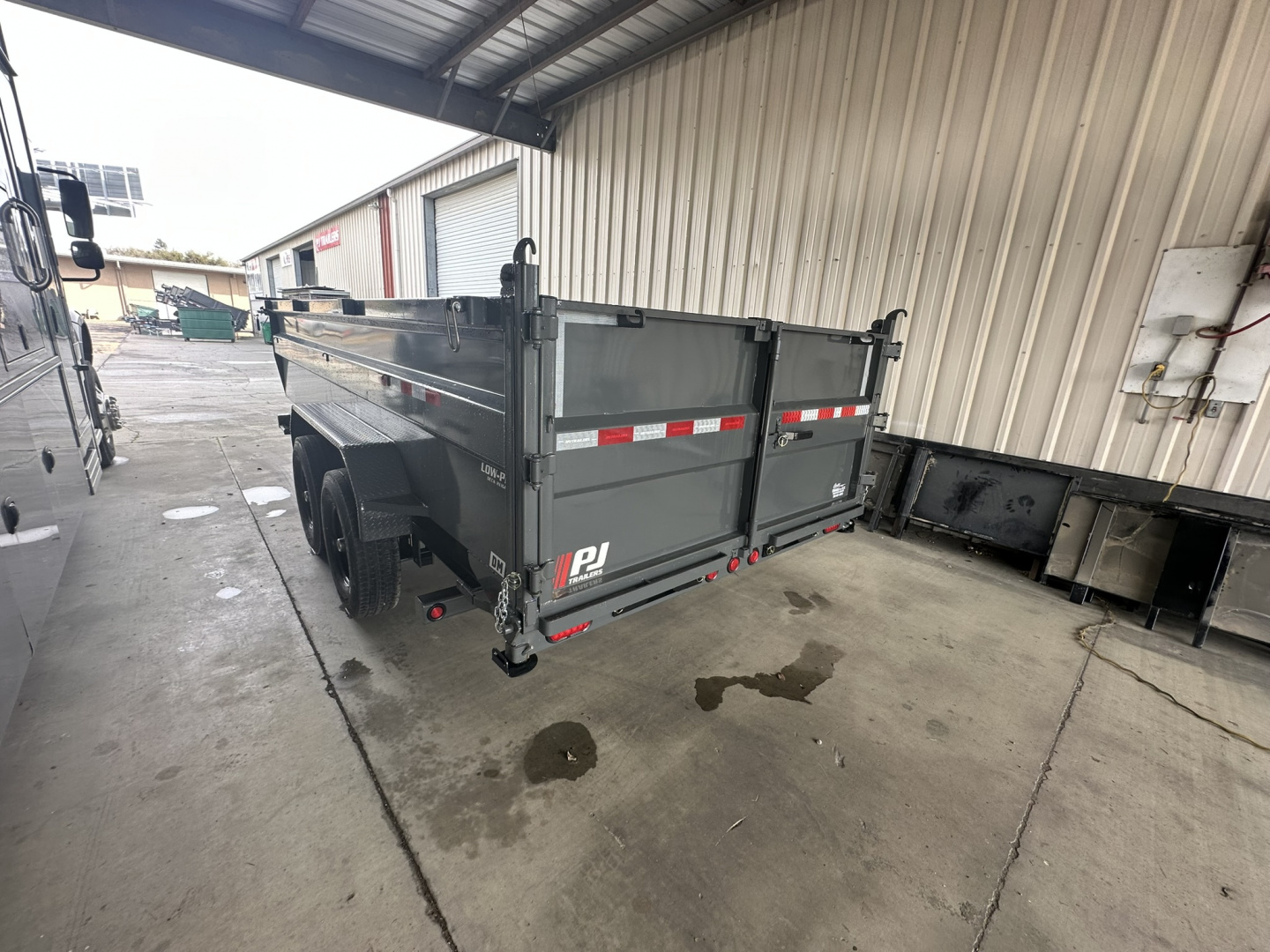 New 2026 PJ Trailers DM 7X16X3 Dump Trailer