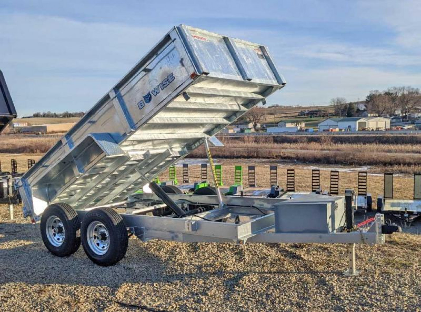 New 2026 BWISE 6'9" x 12 Lo Pro Equipment Dump Trailer - GALVANIZED