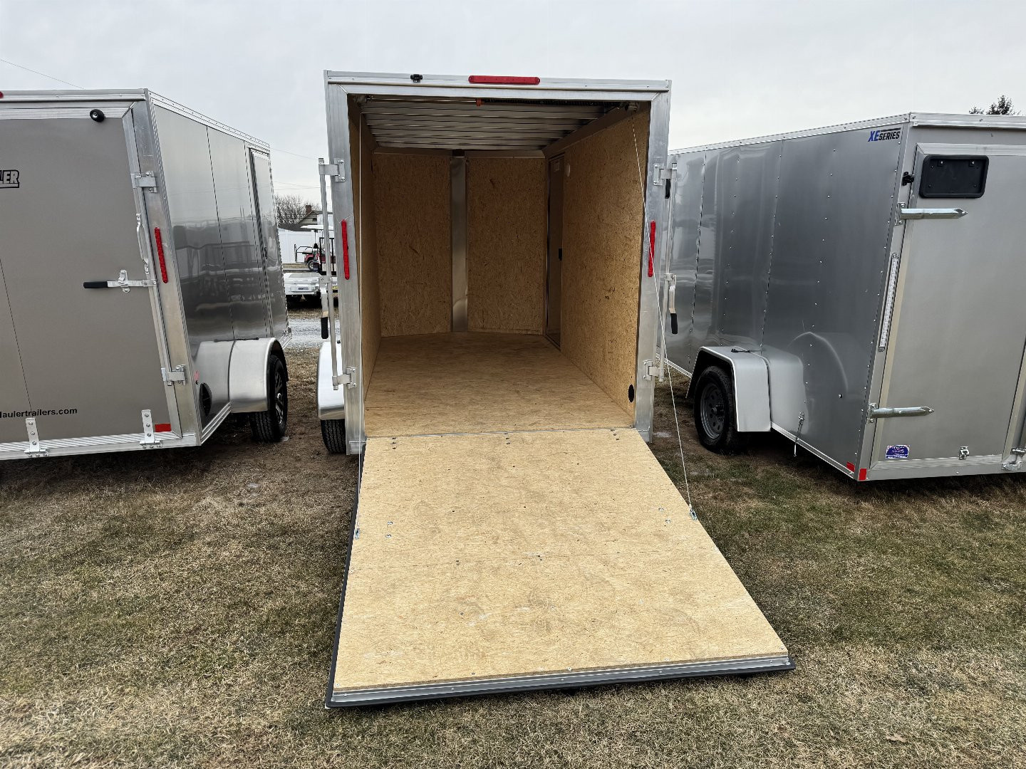 New 2026 E-Z Hauler EZEC6X12SA XLT PRO Cargo / Enclosed Trailer
