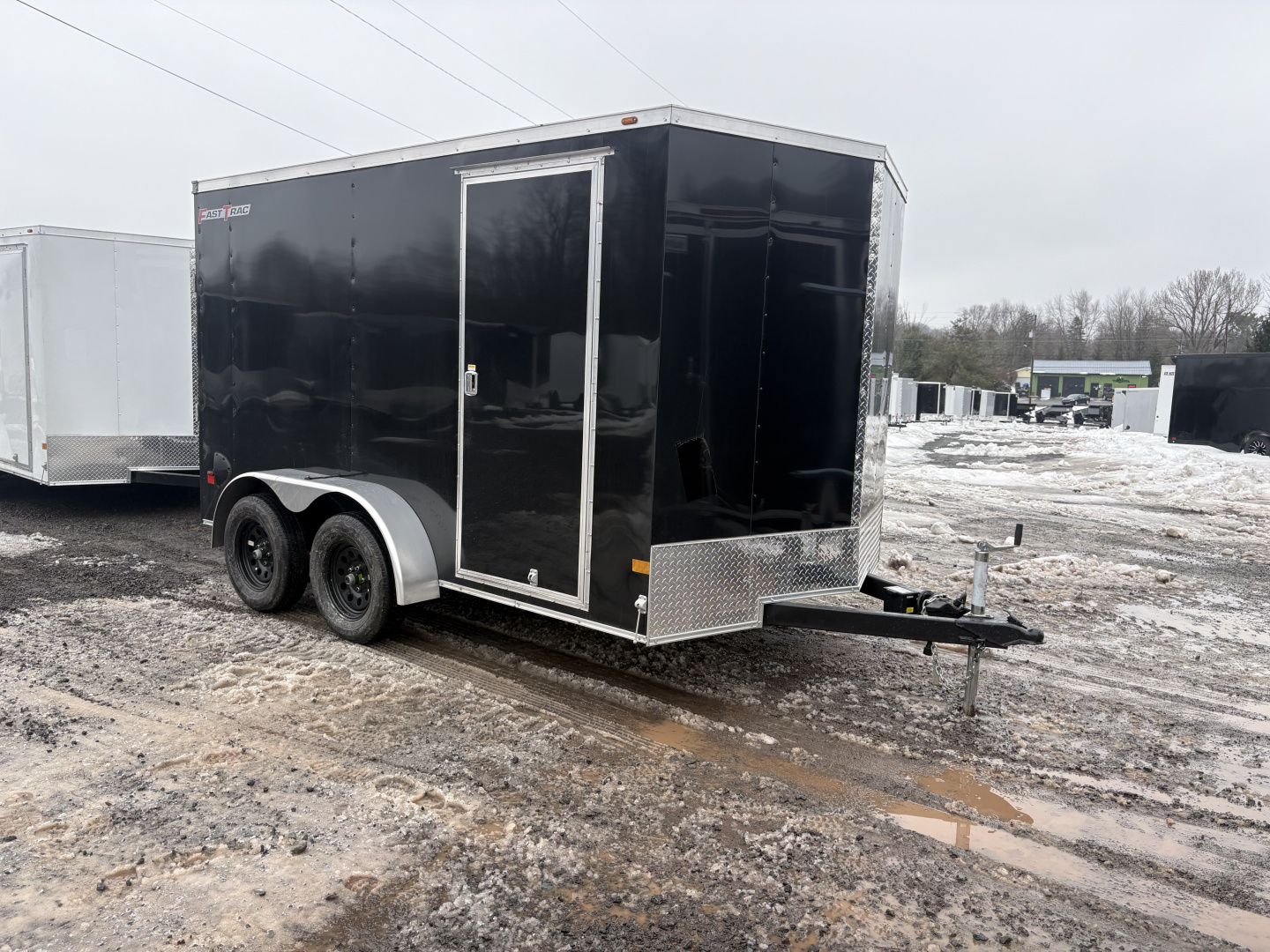 New 2026 WELLS CARGO Fasttrac Deluxe 7x12 7K 6'6" Interior Cargo / Enclosed Trailer with Ramp Door