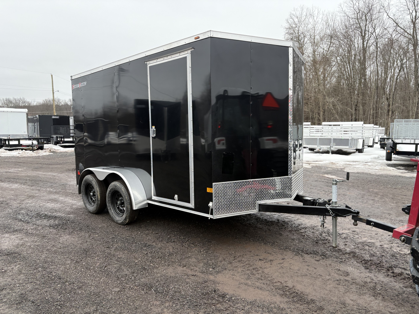 New 2026 Wells Cargo Fasttrac Deluxe 7x12 7K 6'6" Interior Cargo / Enclosed Trailer with rear ramp door