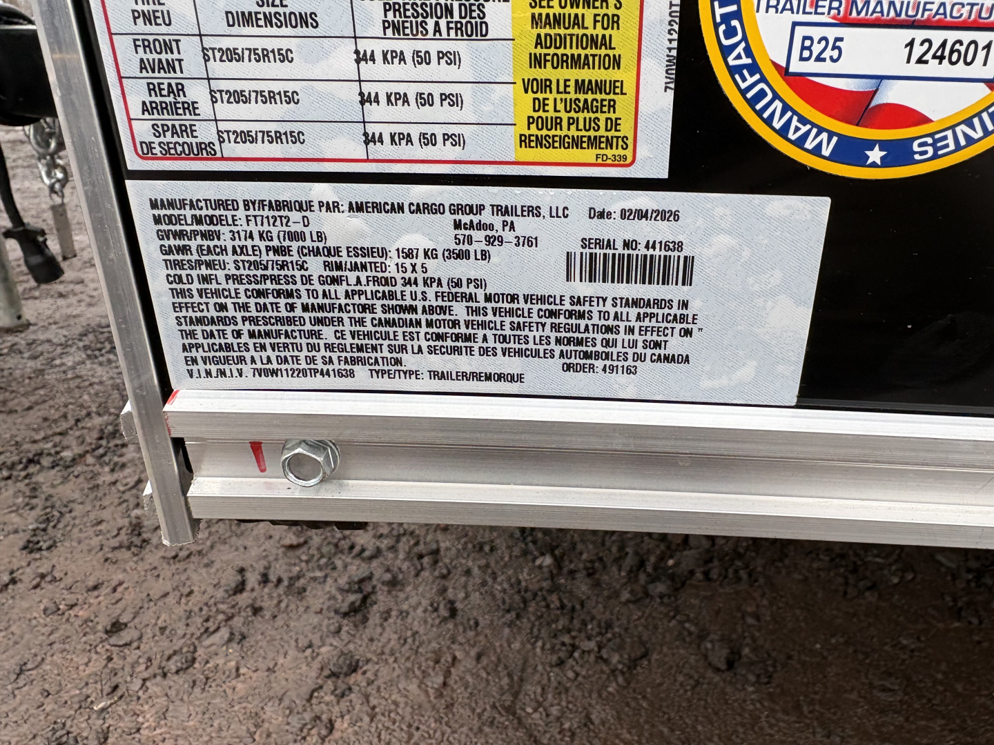 New 2026 Wells Cargo Fasttrac Deluxe 7x12 7K 6'6" Interior Cargo / Enclosed Trailer with rear ramp door
