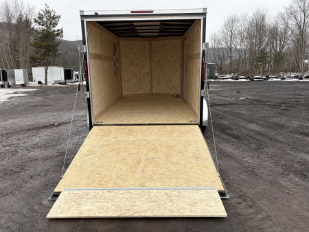 New 2026 Wells Cargo Fasttrac Deluxe 7x12 7K 6'6" Interior Cargo / Enclosed Trailer with rear ramp door