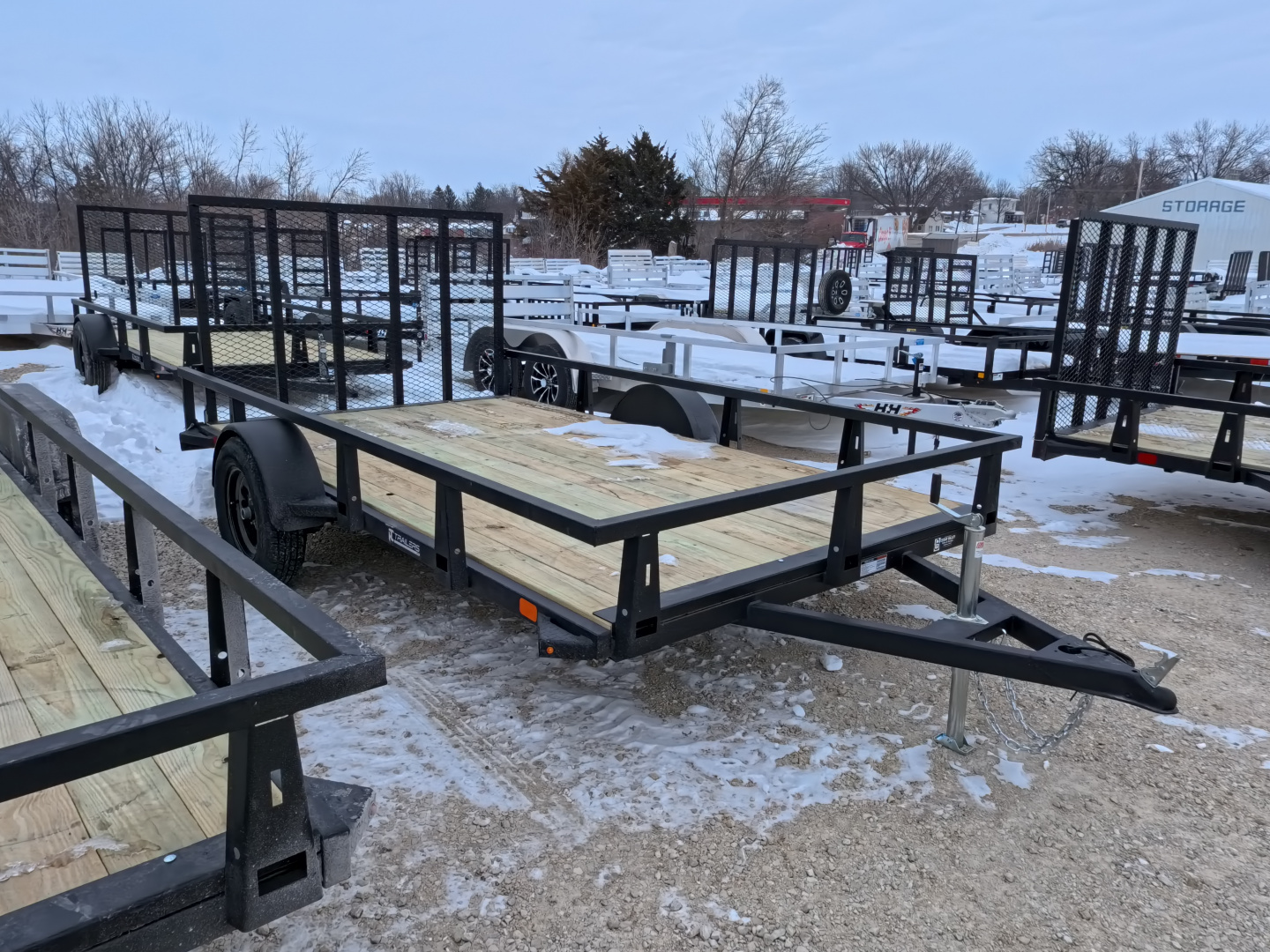 New 2026 HTC 7 x 12 Steel Utility Trailer with 2990 lb. GVWR & Anchor Management Post Side Rails - 4 Hole Securing Options