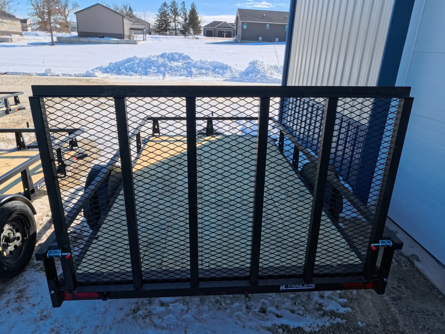 New 2026 HTC 7 x 12 Steel Utility Trailer with Anchor Management Post Side Rails - 4 Hole Securing Options