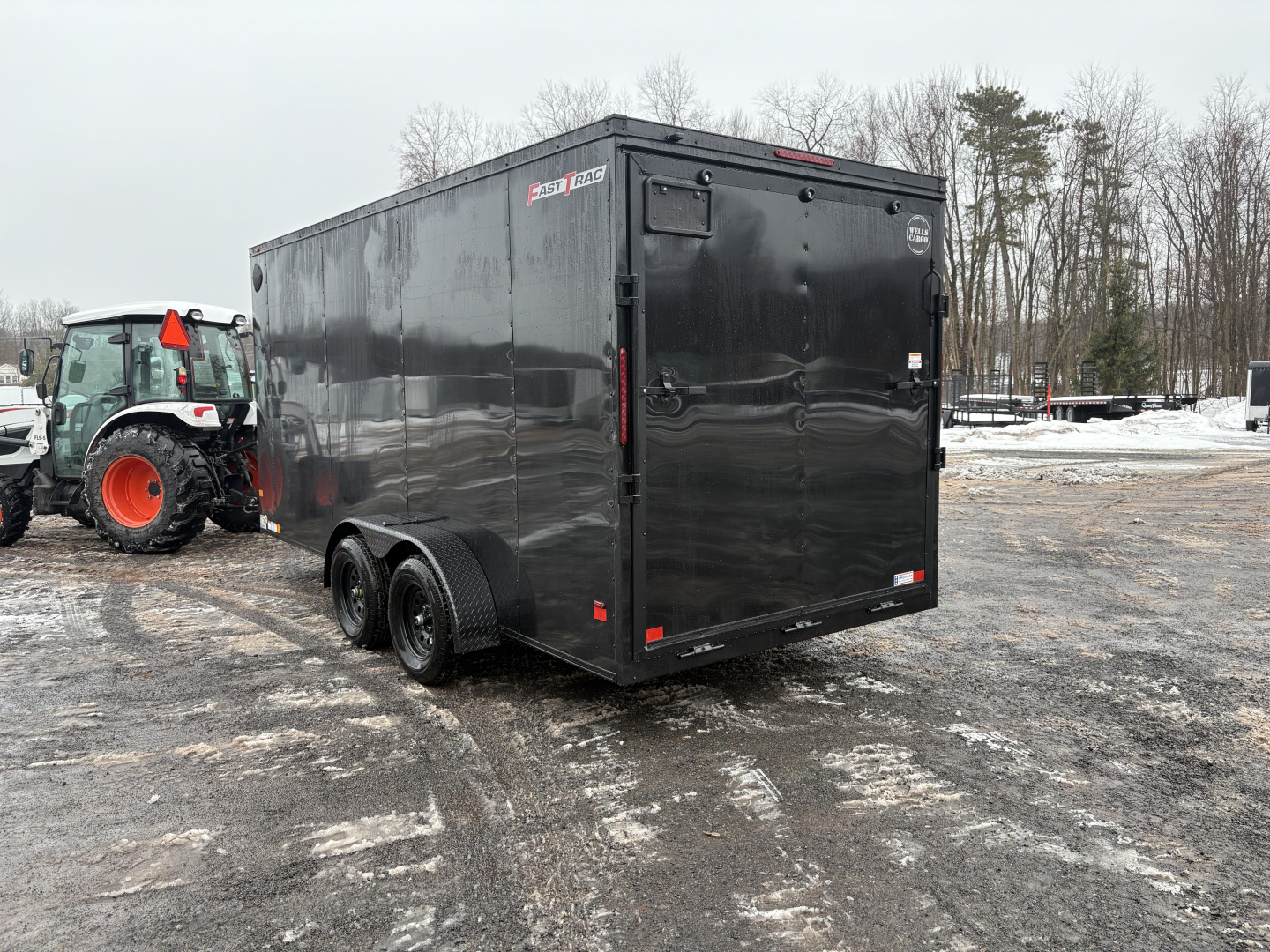 New 2026 WELLS CARGO Fasttrac Deluxe 7x16 7' Interior 7K Cargo / Enclosed Trailer with Rear Ramp