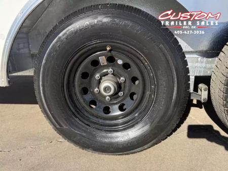 New #002086 2026 CELL TECH TA3 8.5 X 16 TANDEM AXLE ALL STEEL ENCLOSED W/ REAR RAMP DOOR