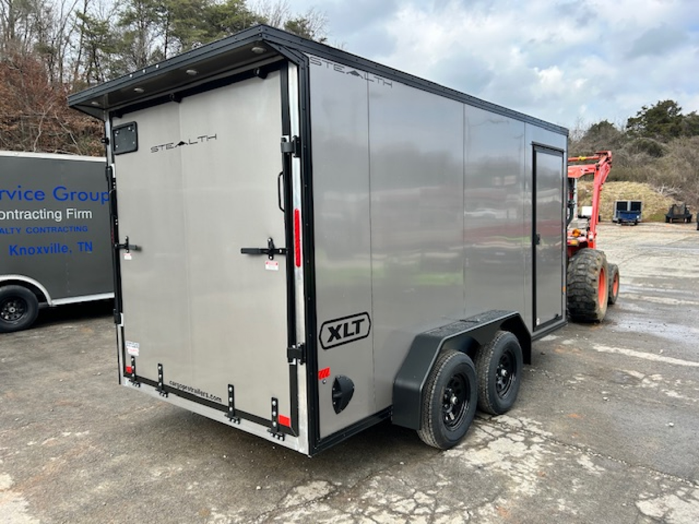 New Stealth Aluminum Enclosed 7x14 XLT Pro Series 7K- Pewter Metallic W/ Black Trim & Wing