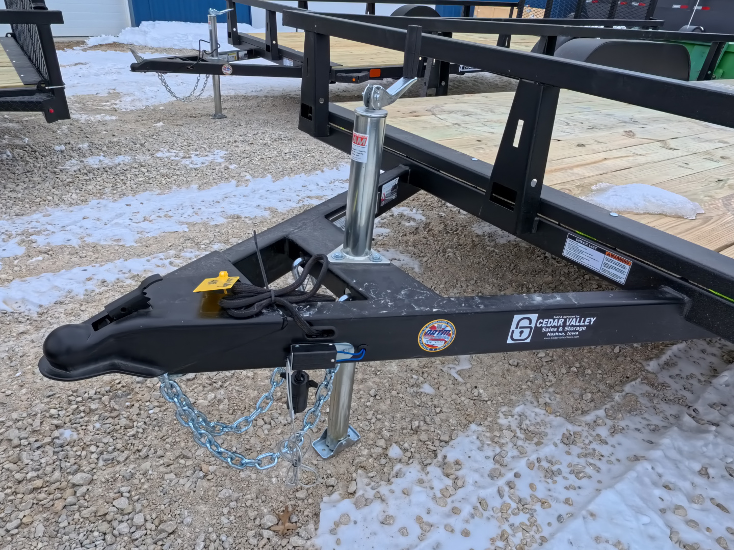New 2026 HTC 7 x 14 Tandem Axle Utility Trailer includes channel uprights with 4 hole cargo securement options, 7K GVWR