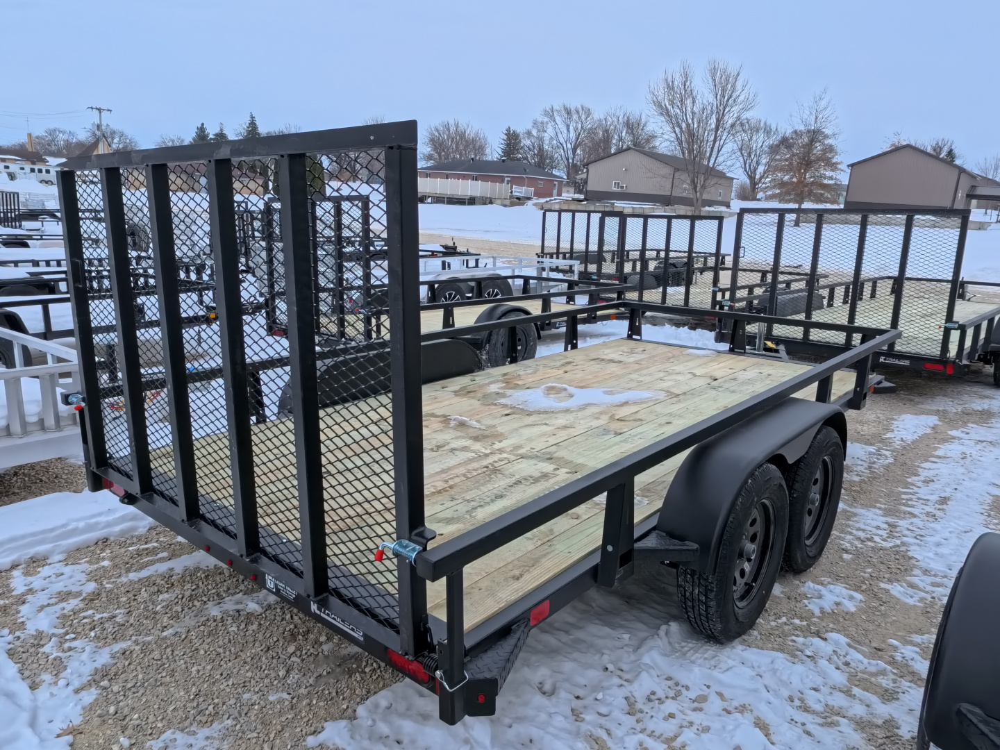New 2026 HTC 7 x 14 Tandem Axle Utility Trailer includes channel uprights with 4 hole cargo securement options, 7K GVWR