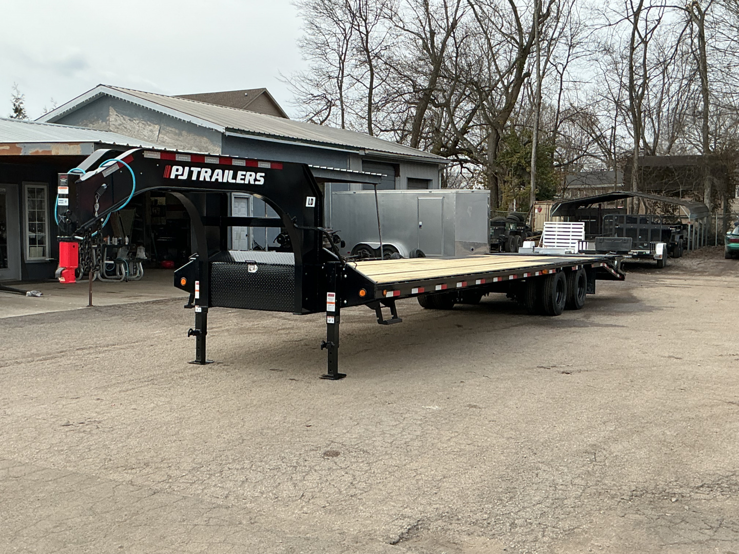 New 2026 PJ Trailers 102" x 35' Low-Pro Flatdeck With Duals (LD) 25.9K w. Monster Ramps Flatbed Trailer