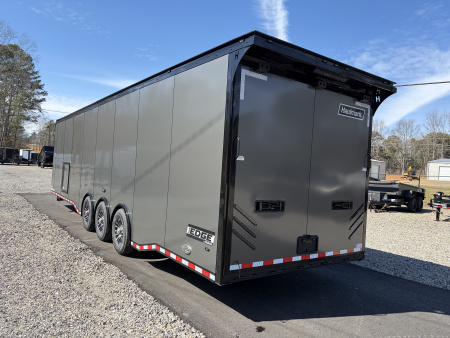 New 2026 Haulmark 34 Bathroom Race Trailer, Air Prep PKG, Awning, Polycor, Insulated, Window, 54" ALX Slide Out Step, A/C + Heat