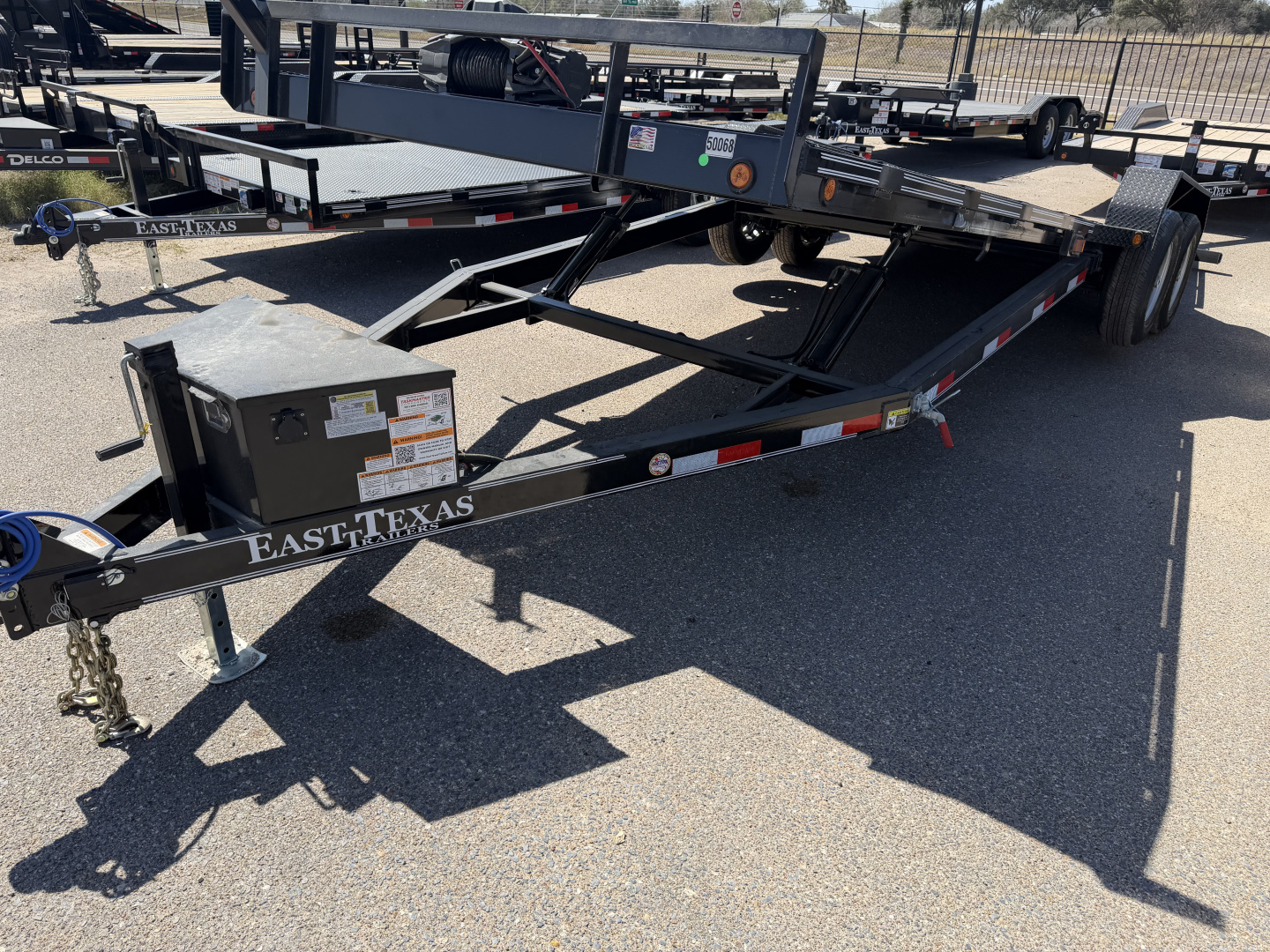 New 2026 East Texas Trailers 83x22ft Tilt Medium Duty Car Hauler w/Winch