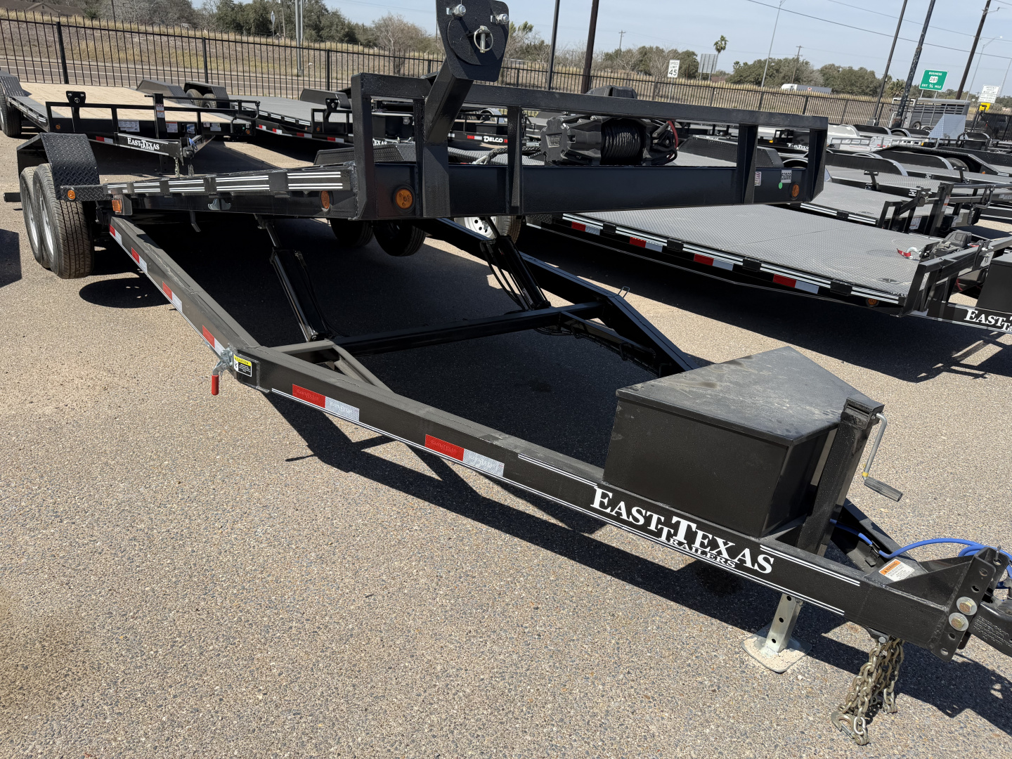 New 2026 East Texas Trailers 83x22ft Tilt Medium Duty Car Hauler w/Winch