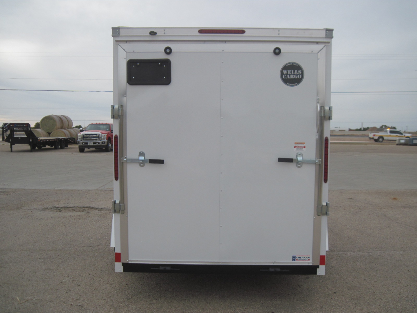 New 2026 Wells Cargo 6x12x6.5 FastTrac Deluxe Cargo w/ Ramp