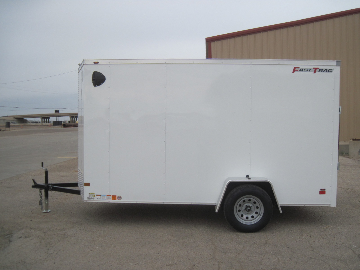 New 2026 Wells Cargo 6x12x6.5 FastTrac Deluxe Cargo w/ Ramp