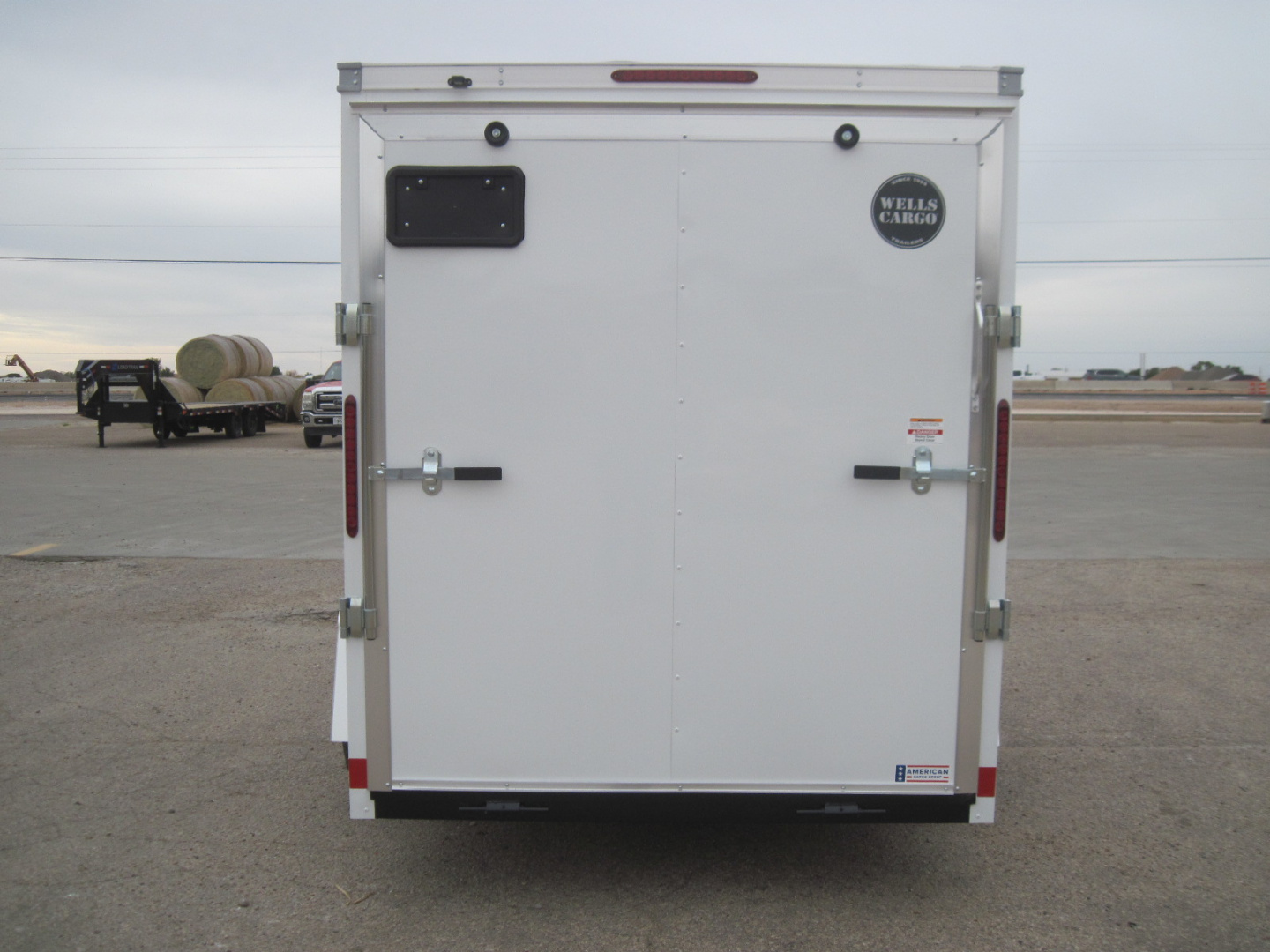 New 2026 Wells Cargo 6x12x6.5 FastTrac Deluxe Cargo w/ Ramp
