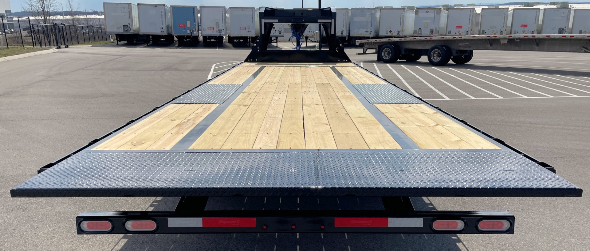 New Diamond C 28' DET 210 GN Deck Over Power Tilt Equipment Trailer: 23K GVWR, Spare, Solar
