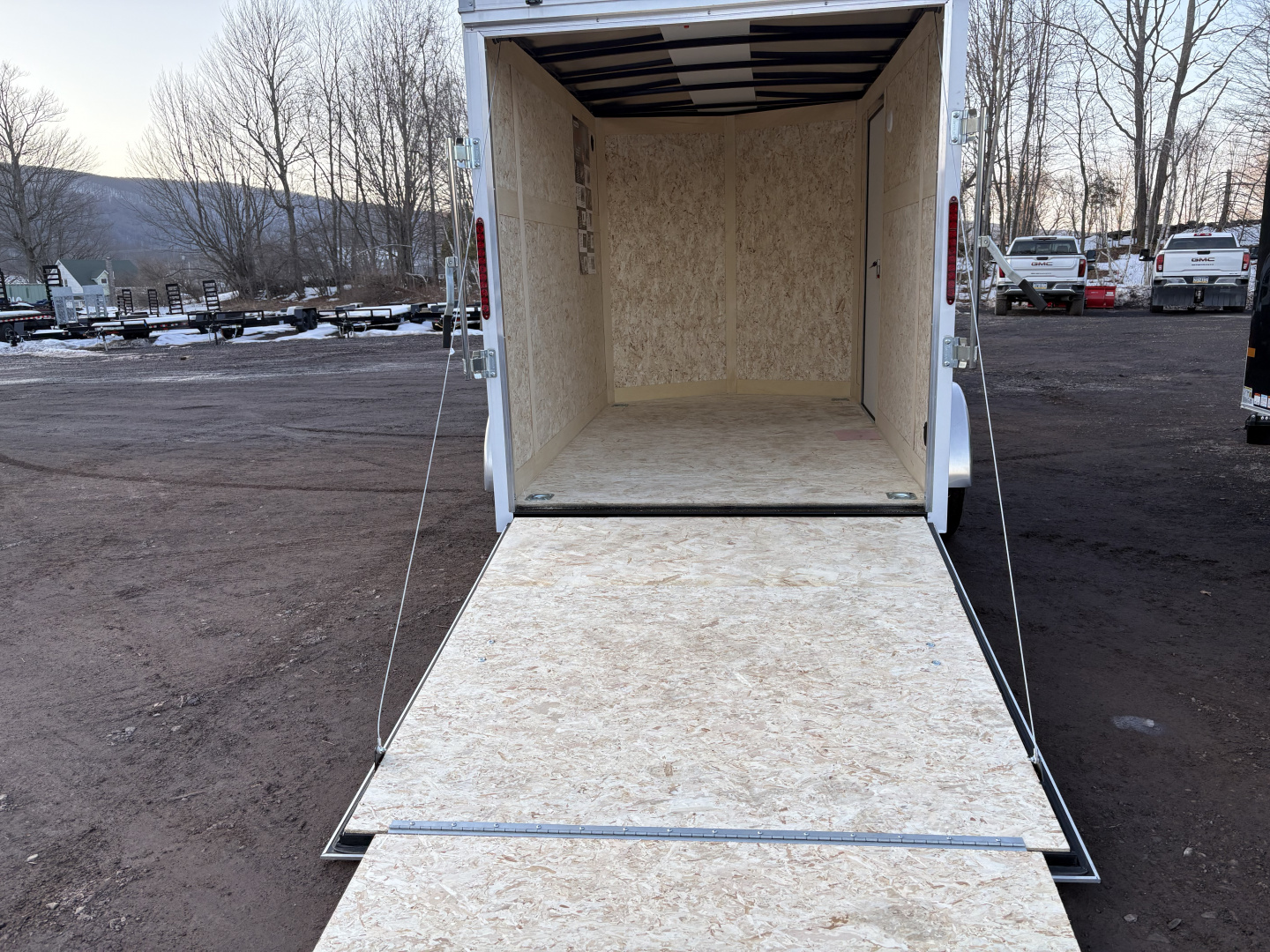 New 2026 Haulmark 6x10 6'6" Interior Passport Deluxe Cargo / Enclosed Trailer with Ramp Door