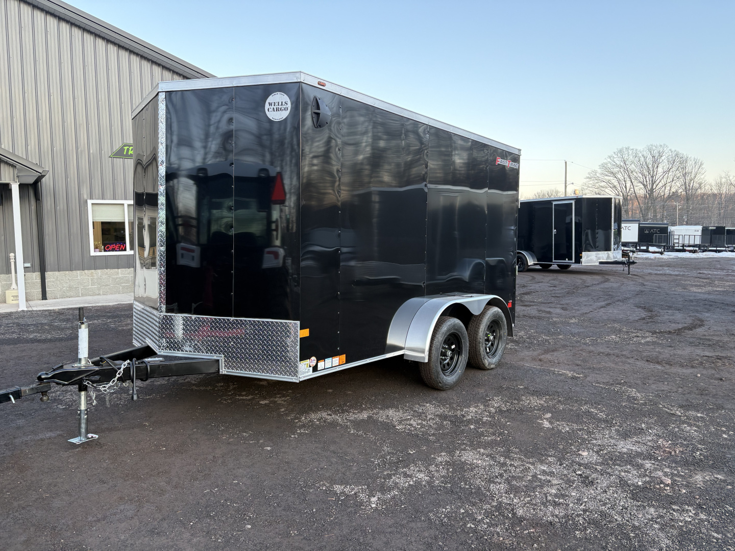 New 2026 WELLS CARGO Fasttrac Deluxe 7x12 7K 6'6" Interior Height Cargo / Enclosed Trailer with Ramp Door