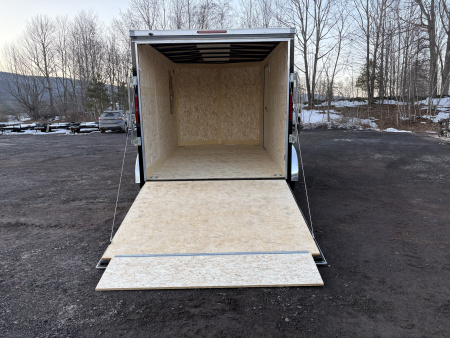 New 2026 WELLS CARGO Fasttrac Deluxe 7x12 7K 6'6" Interior Height Cargo / Enclosed Trailer with Ramp Door