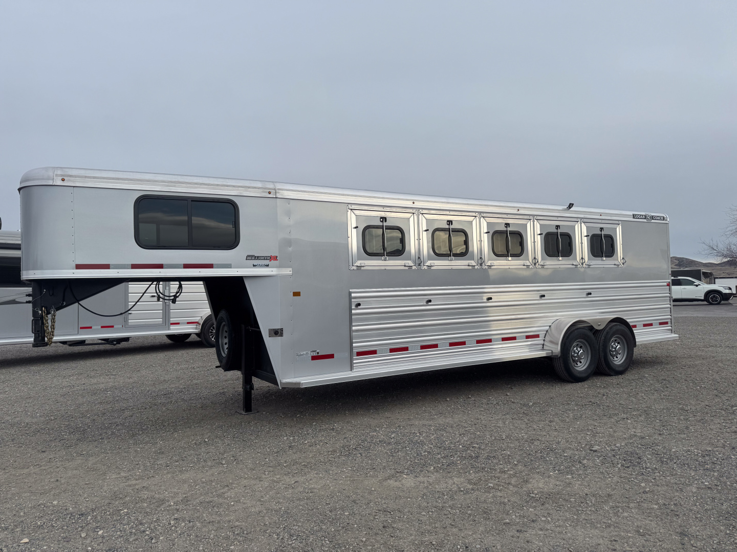 New 2026 Logan Coach Bullseye 5H GN Horse Trailer