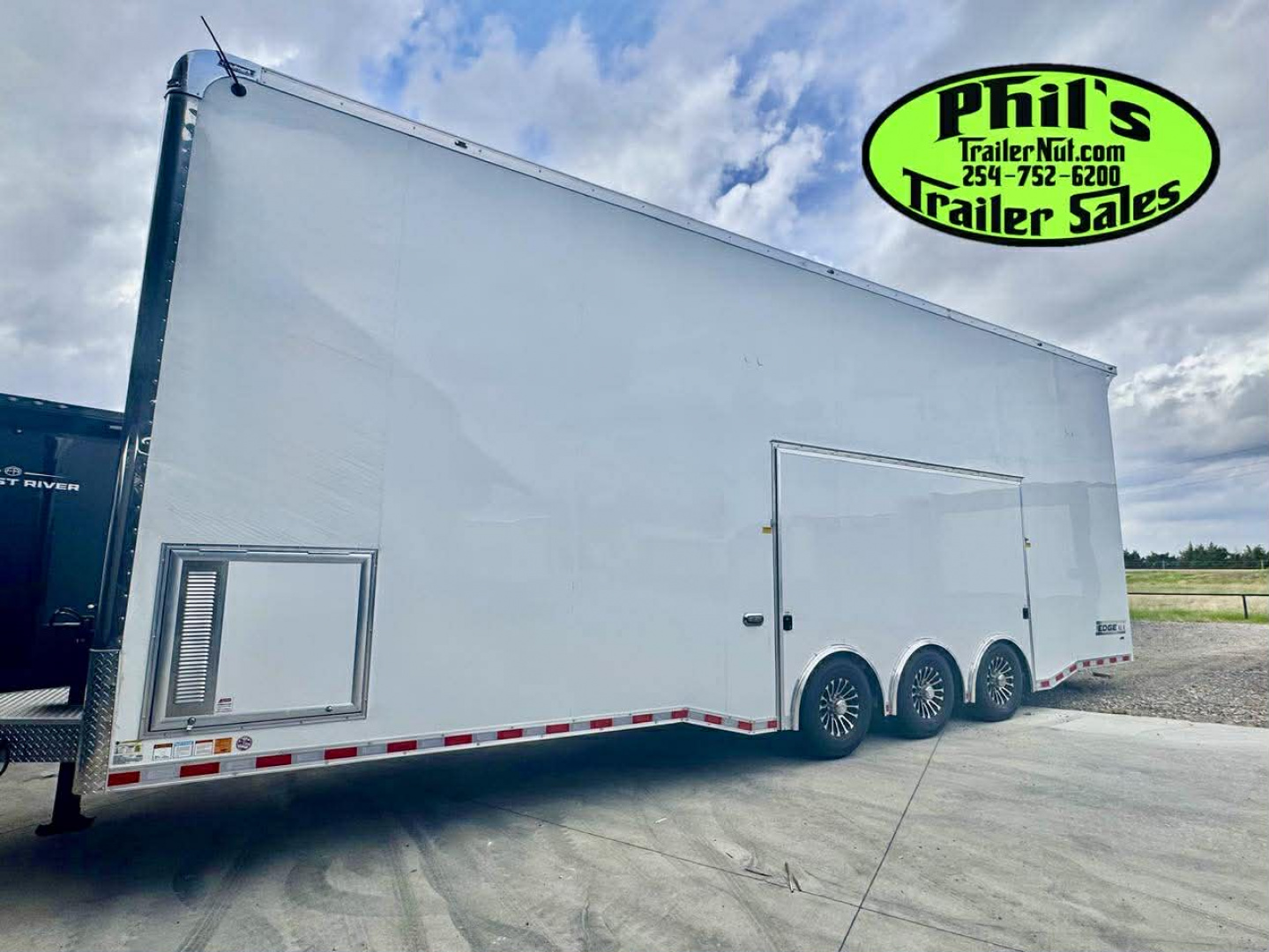New Haulmark NEW 85X32 ALUMINUM STACKER WITH ESCAPE DOOR ENCLOSED RACE TRAILER Car / Racing Trailer TWO CAR HAULER DELIVERY OUT OF UTAH!!