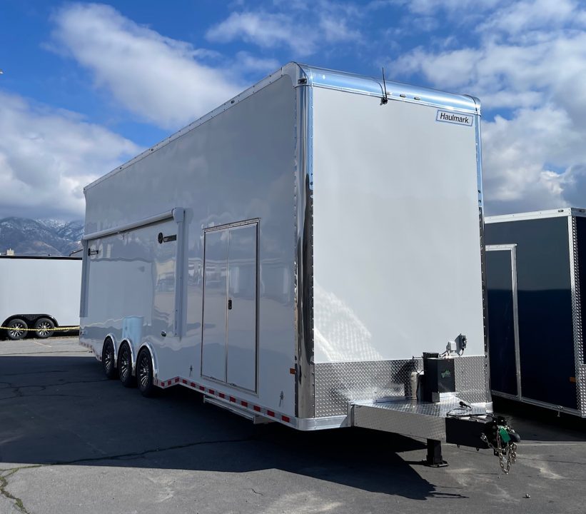 New Haulmark NEW 85X32 ALUMINUM STACKER WITH ESCAPE DOOR ENCLOSED RACE TRAILER Car / Racing Trailer TWO CAR HAULER DELIVERY OUT OF UTAH!!