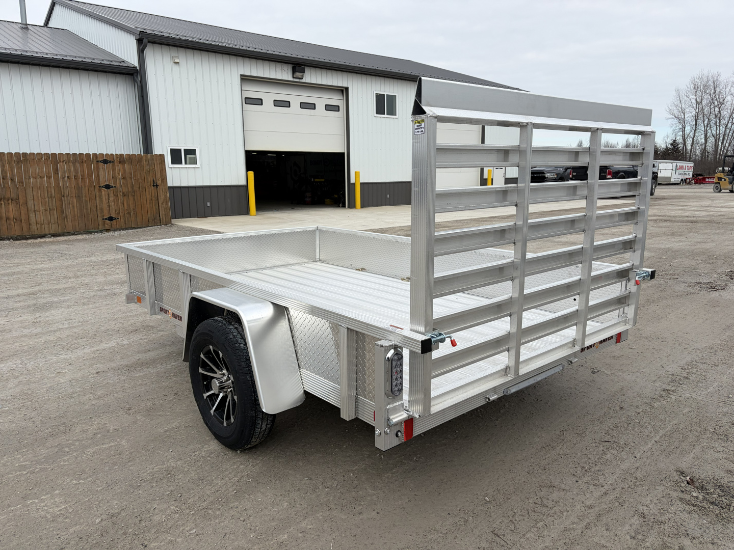 New 2026 Sport Haven AUT610DS (6' x 10') 2.9K Utility Trailer w/ ATP Sides