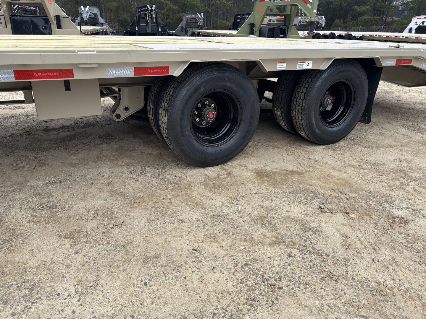 New 2026 RawMaxx FDX 102X30 Flatbed Trailer / 12" OC / MAXX RAMPS / BRIDGE FRAME / TORQUE TUBE / CHAIN RACK / 14 PLY TIRES / ELEC - HYD BRAKES / 25.99K GVWR