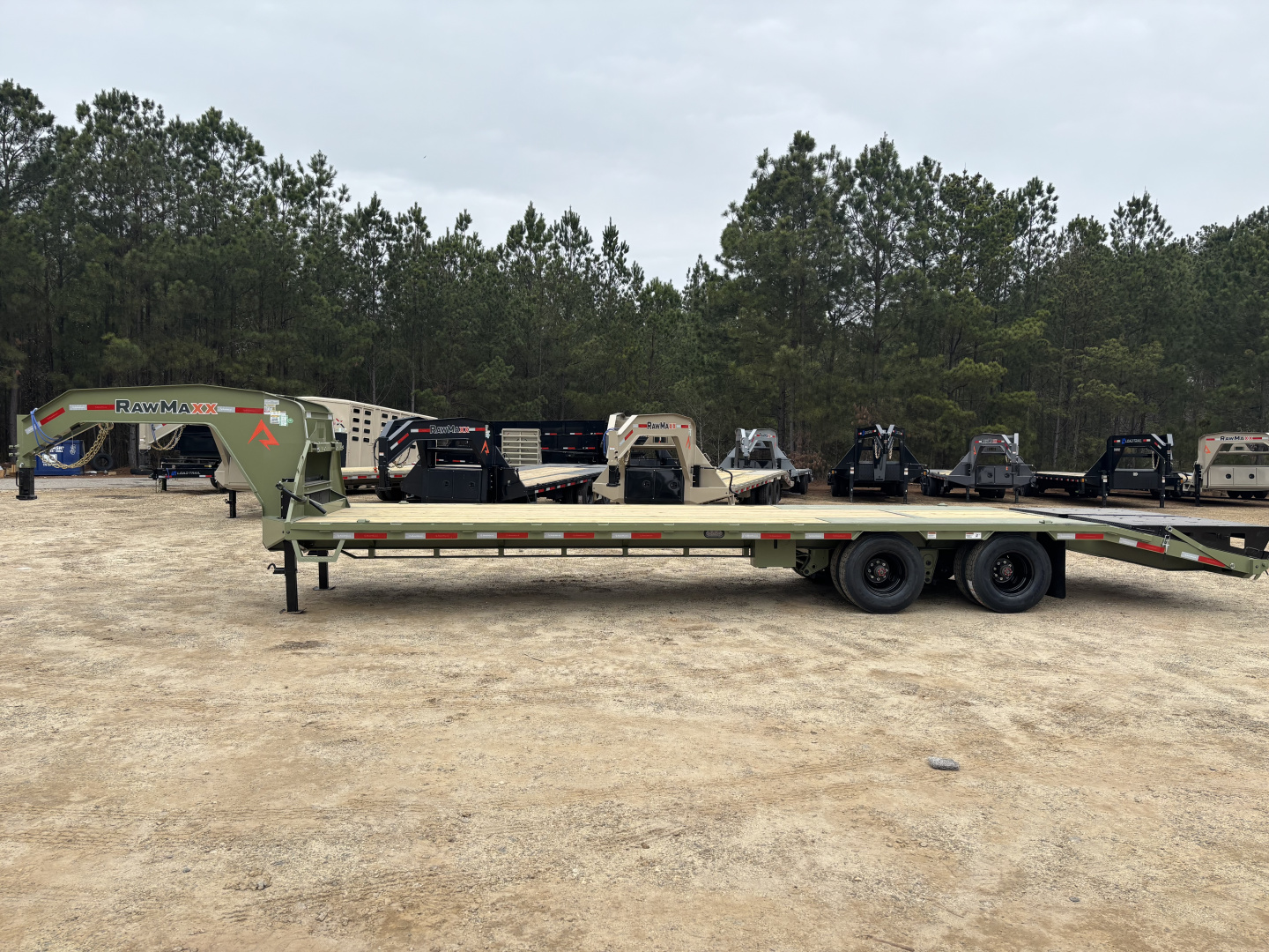 New 2026 RawMaxx FDX 102X30 Flatbed Trailer / 12" OC / MAXX RAMPS / BRIDGE FRAME / TORQUE TUBE / CHAIN RACK / 14 PLY TIRES / ELEC - HYD BRAKES / 25.99K GVWR