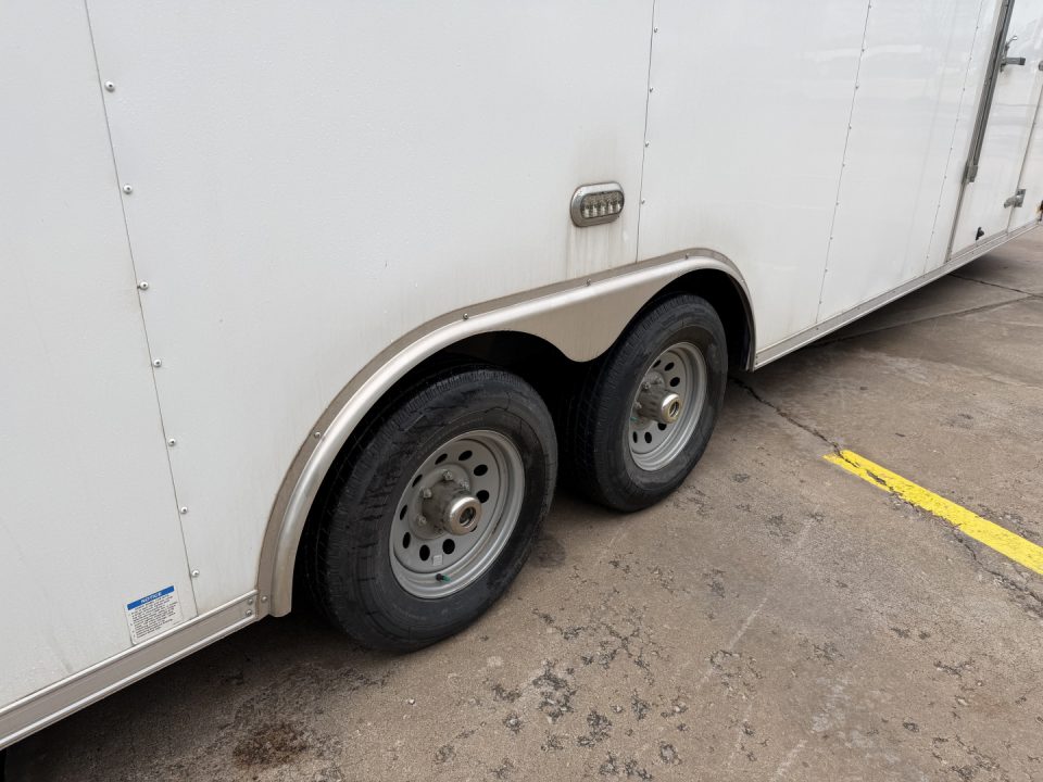 Used #084115 USED 2022 FOREST RIVER TA3 8.5 X 28 TANDEM AXLE 10K ENCLOSED W/ REAR RAMP DOOR