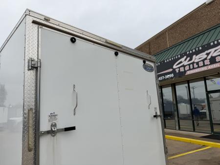 Used #084115 USED 2022 FOREST RIVER TA3 8.5 X 28 TANDEM AXLE 10K ENCLOSED W/ REAR RAMP DOOR