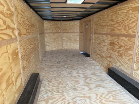 Used #084115 USED 2022 FOREST RIVER TA3 8.5 X 28 TANDEM AXLE 10K ENCLOSED W/ REAR RAMP DOOR