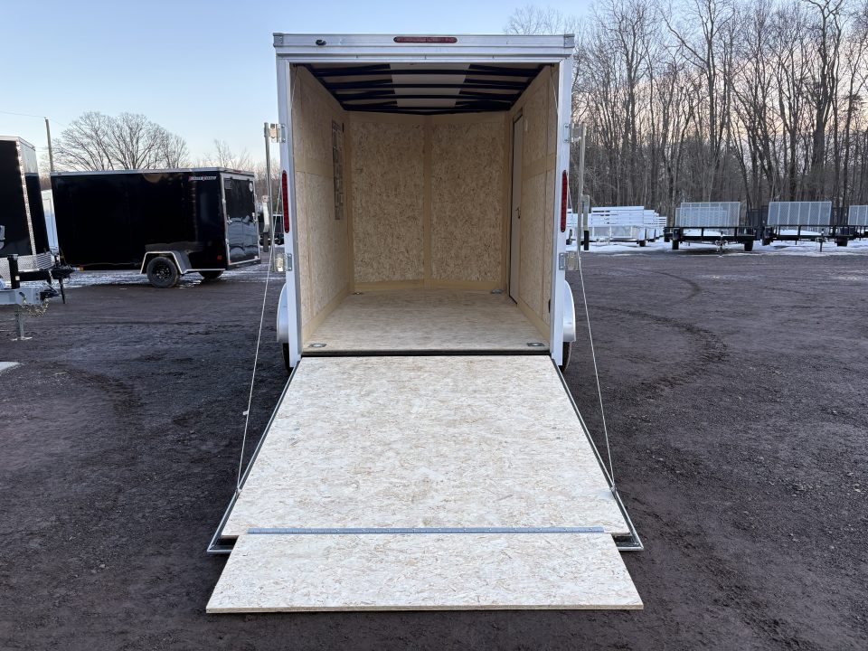 New 2026 WELLS CARGO 6x10 6'6" Interior Height Fasttrac Deluxe Cargo / Enclosed Trailer w/Ramp Door