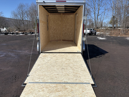 New 2026 WELLS CARGO 6x10 6'6" Interior Height Fasttrac Deluxe Cargo / Enclosed Trailer w/Ramp Door