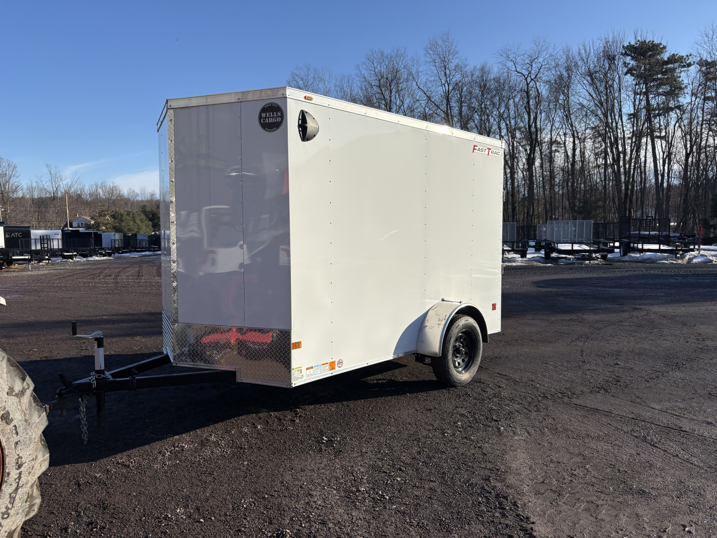 New 2026 WELLS CARGO 6x10 6'6" Interior Height Fasttrac Deluxe Cargo / Enclosed Trailer w/Ramp Door