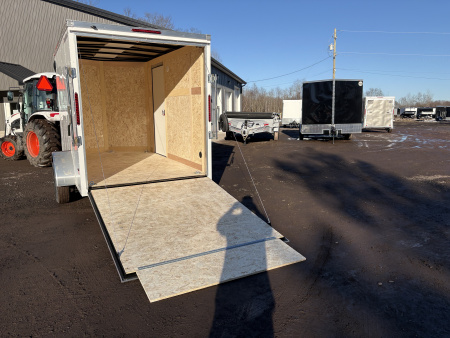 New 2026 WELLS CARGO 6x10 6'6" Interior Height Fasttrac Deluxe Cargo / Enclosed Trailer w/Ramp Door