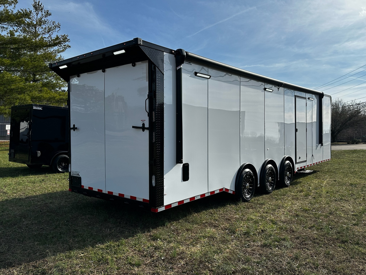 New 2026 Rock Solid Cargo 8.5x32 Bathroom/Race Trailer- Finished Interior-FLAT FRONT-7000LB Triple Torsion - 4X6 Escape Door - 25ft Awning