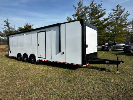 New 2026 Rock Solid Cargo 8.5x32 Bathroom/Race Trailer- Finished Interior-FLAT FRONT-7000LB Triple Torsion - 4X6 Escape Door - 25ft Awning
