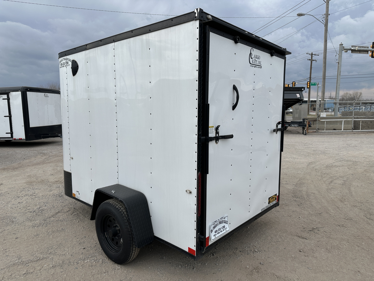 New 2024 Cargo Craft 6'x10'x6'6" Elite V Nose Sport with Ramp Cargo / Enclosed Trailer