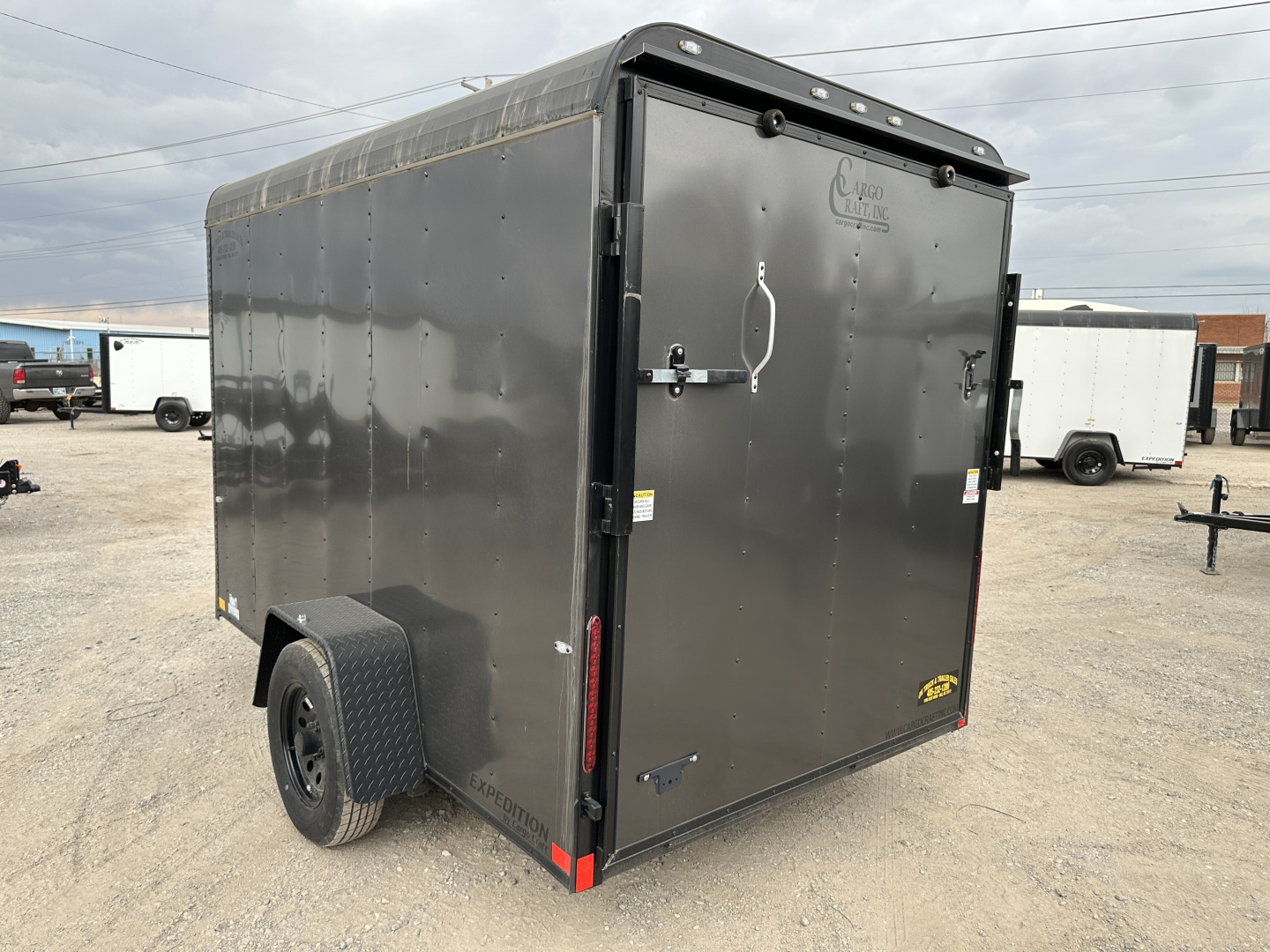 New 2025 Cargo Craft 6'x10'x6'6" Expedition Extreme Charcoal Black out with ramp door Cargo / Enclosed Trailer