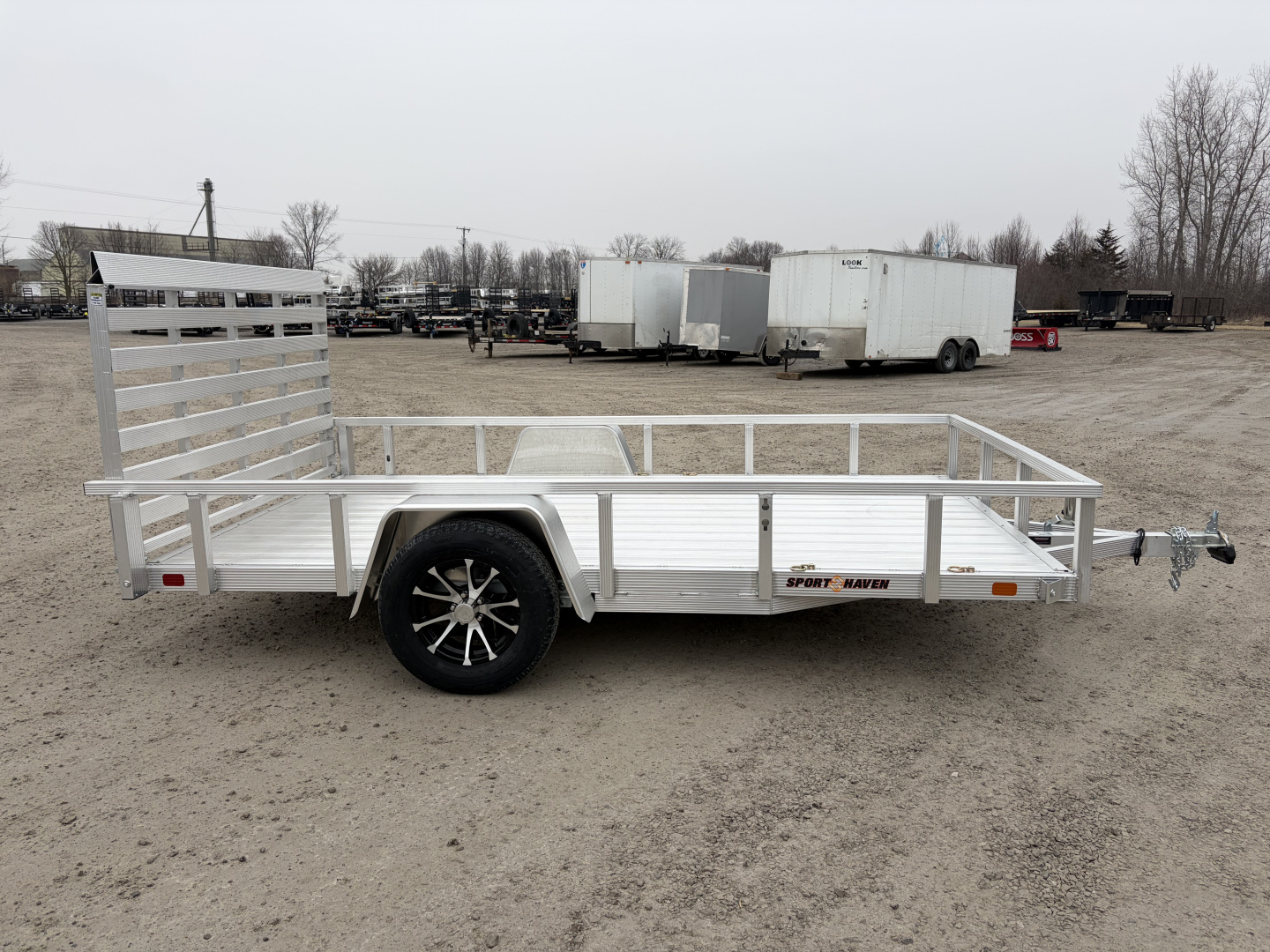 New 2026 Sport Haven AUT712D (7' X 12') 2.9K Single Axle Deluxe Utility Trailer
