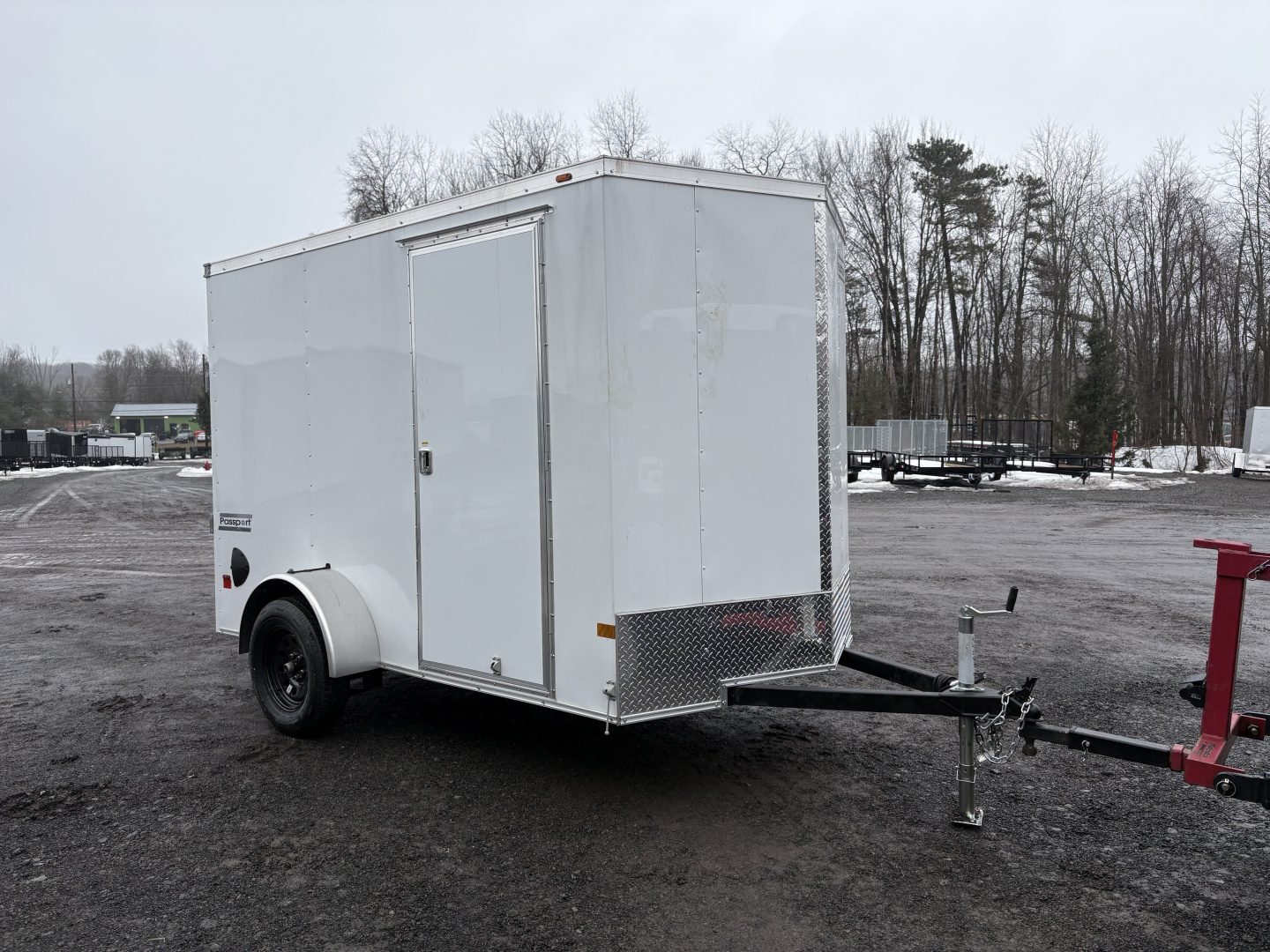 New 2026 Haulmark 6x10 6'6" Interior Passport Deluxe Cargo / Enclosed Trailer with Ramp Door