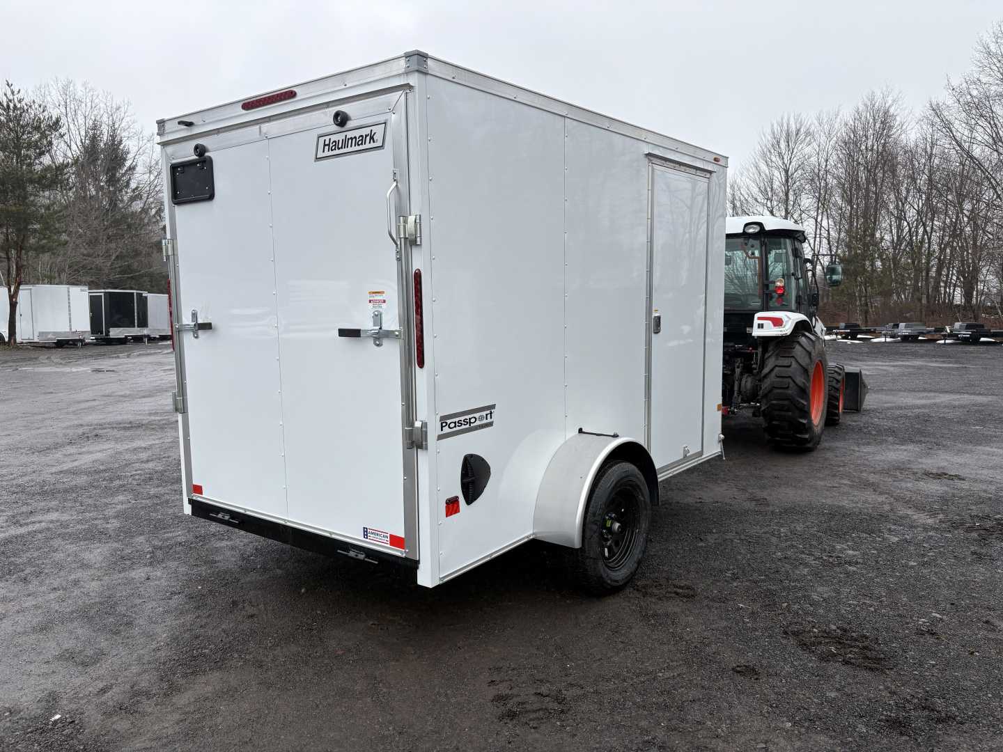 New 2026 Haulmark 6x10 6'6" Interior Passport Deluxe Cargo / Enclosed Trailer with Ramp Door
