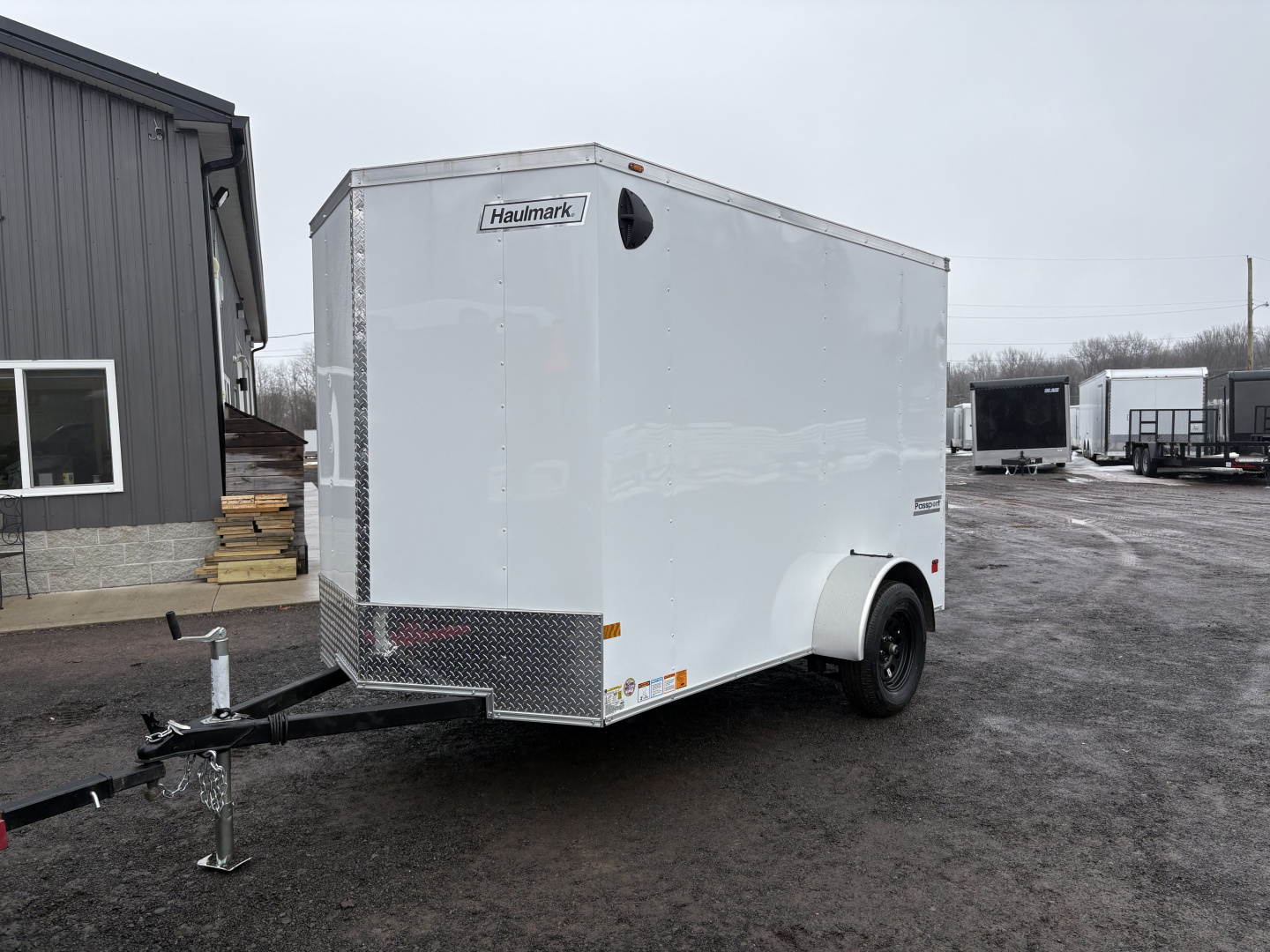 New 2026 Haulmark 6x10 6'6" Interior Passport Deluxe Cargo / Enclosed Trailer with Ramp Door