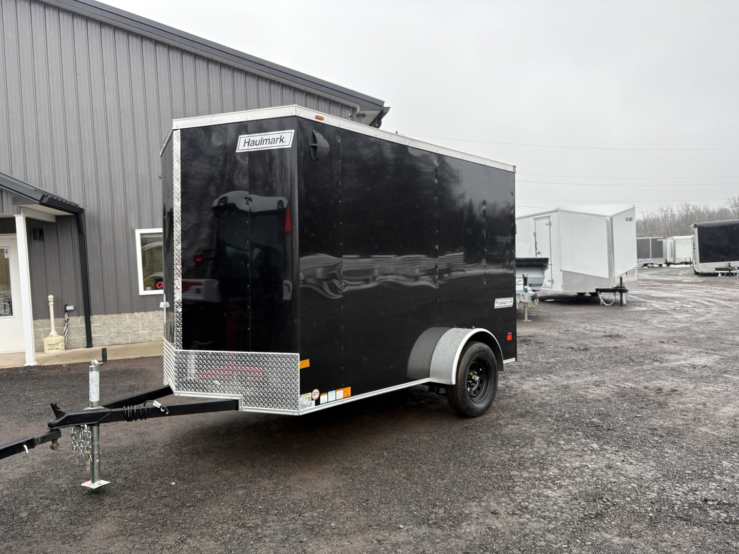 New 2026 Haulmark 6x10 6'6" Interior Passport Deluxe Cargo / Enclosed Trailer with Ramp Door