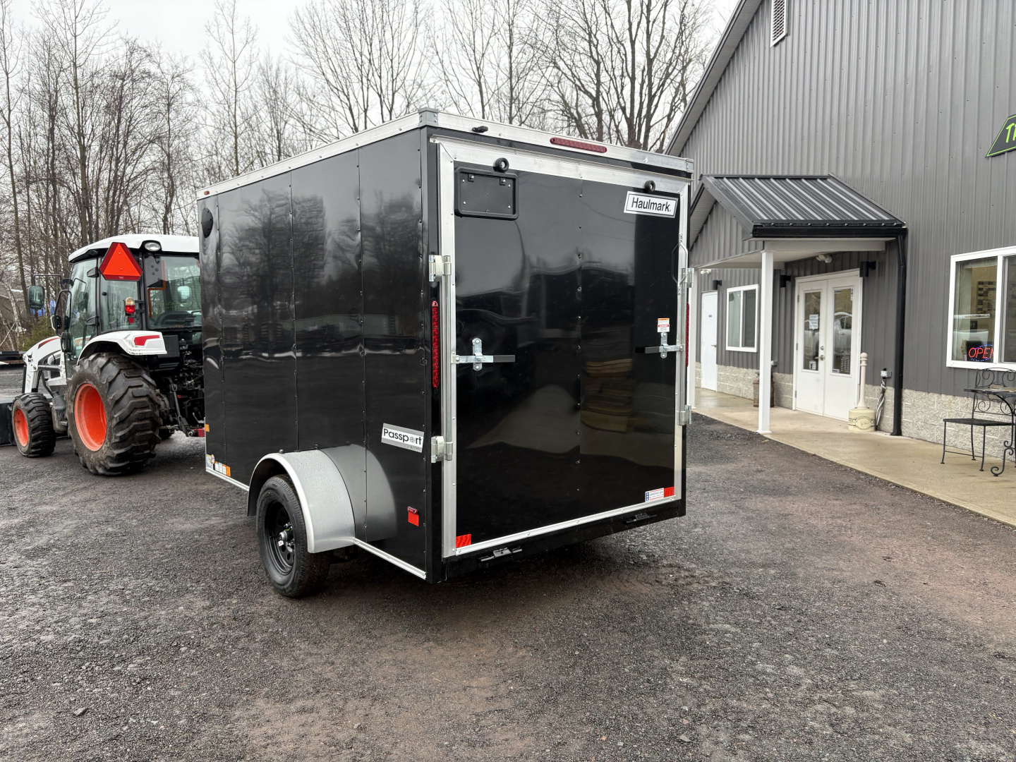 New 2026 Haulmark 6x10 6'6" Interior Passport Deluxe Cargo / Enclosed Trailer with Ramp Door
