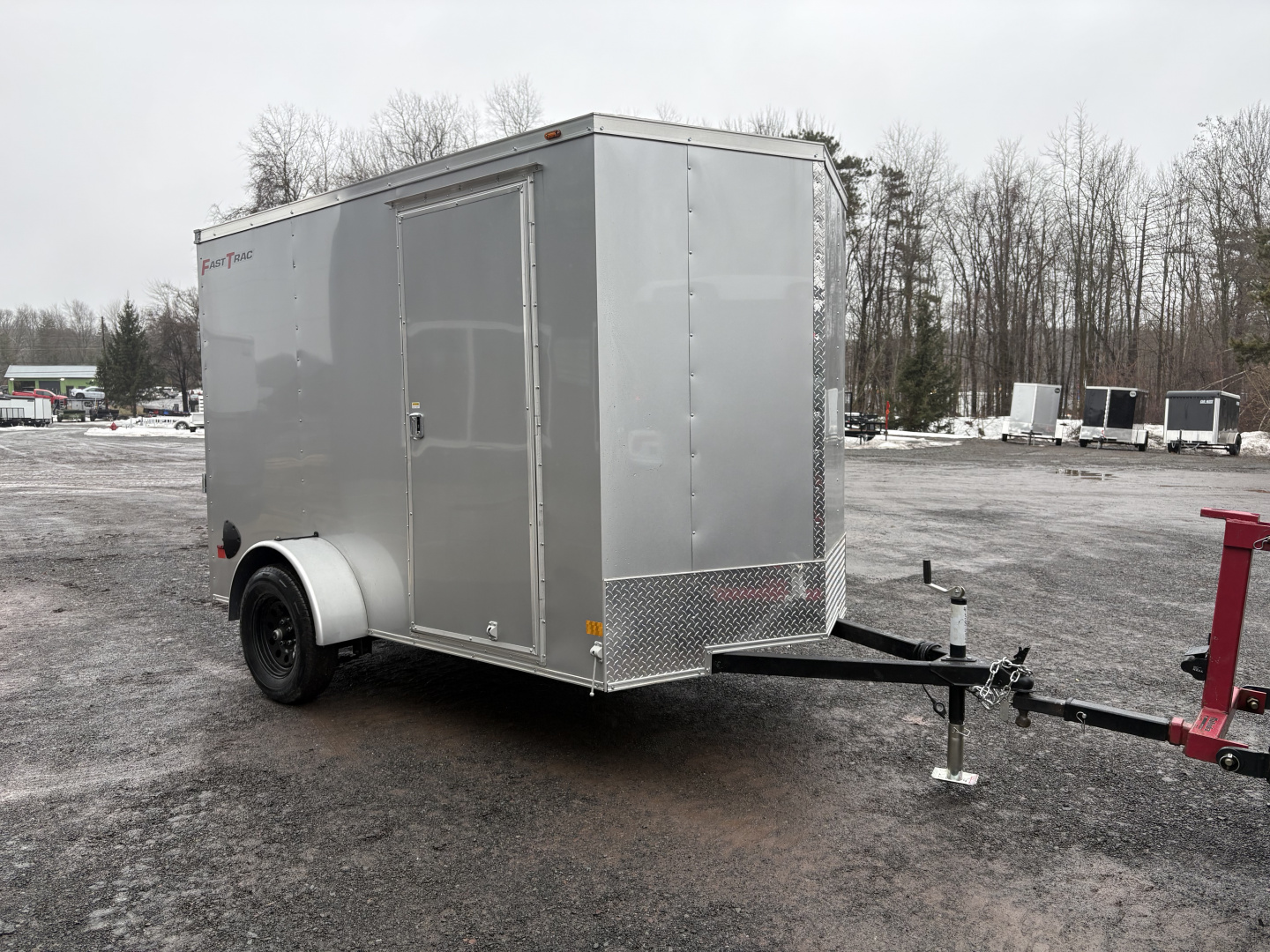 New 2026 Wells Cargo 6x10 6'6" Interior Fasttrac Deluxe Cargo / Enclosed Trailer with Ramp Door